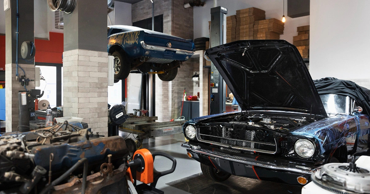 a car sitting in a mechanic shop