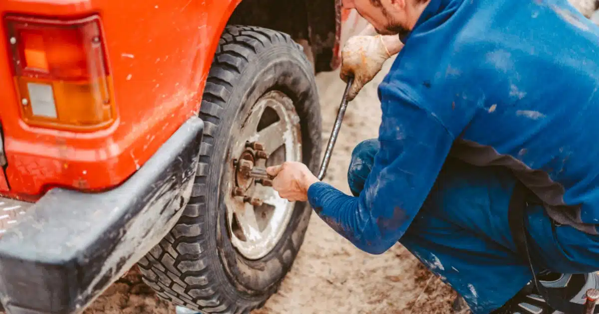 man changing a tire